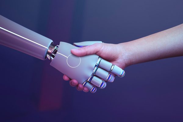 Ai robot shaking hands with human