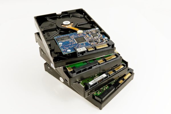 Computer storage hard drives stacked up