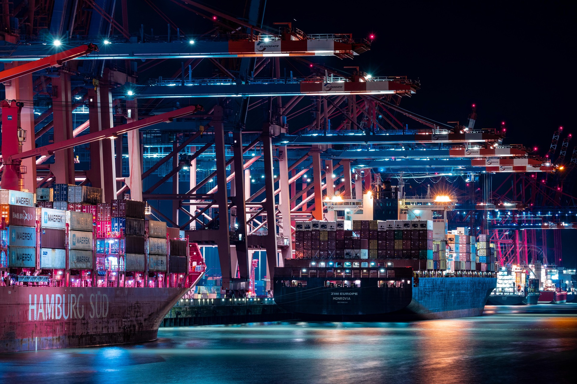 Hamburg port at night with lights on