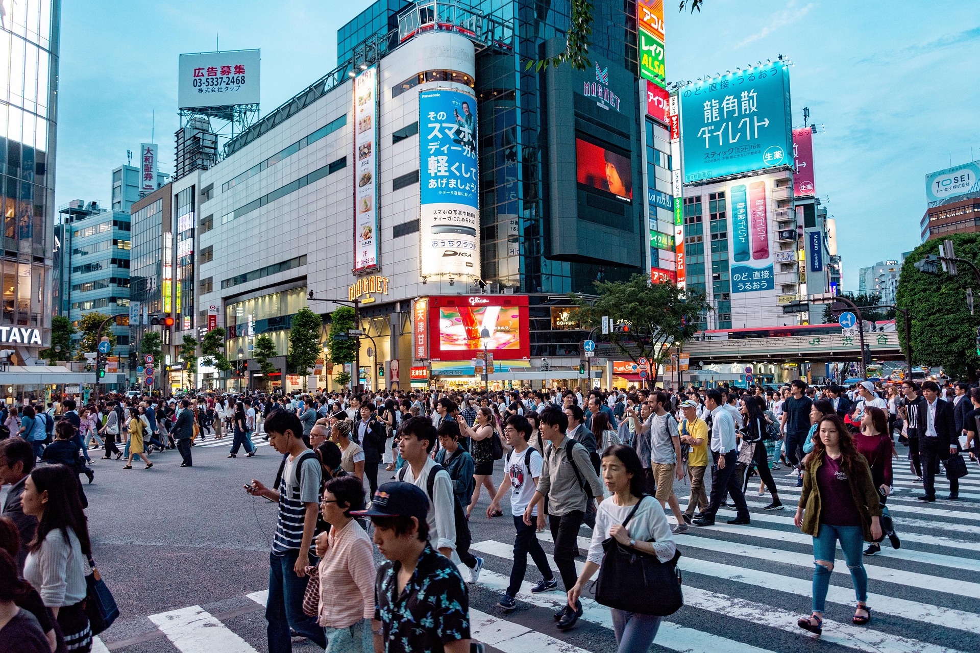 Japanese city many people walking through busy intersection
