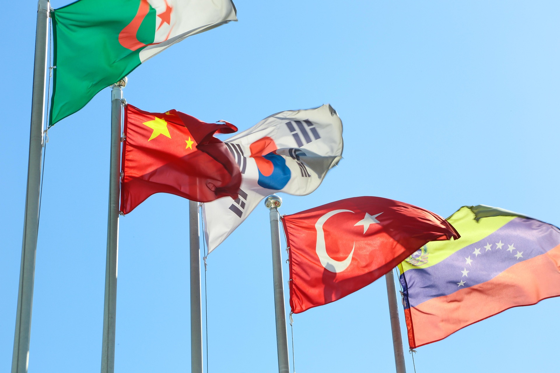 Multiple world flags including China Korea and Pakistan